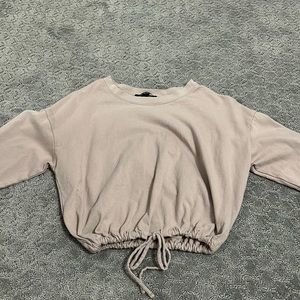 Long sleeve cropped shirt. Forever 21. Size Small. For kids/teens.